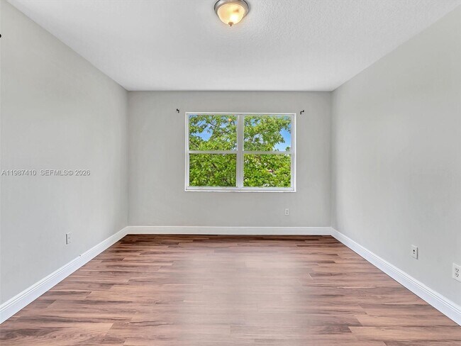 Building Photo - 1498 SW 106th Ave