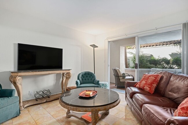 Building Photo - Total Quality Living! El Escorial... EAST BEACH!