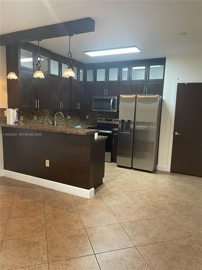 Building Photo - 11115 W Okeechobee Rd