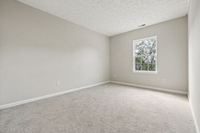 Building Photo - Welcoming 4-bed, 2.5-bath home in Durham offers thoughtful touches throughout.