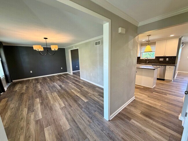 Building Photo - Modern Comforts Await: Spacious Rental with 2-Car Garage, Private Office, and Finished Basement w...