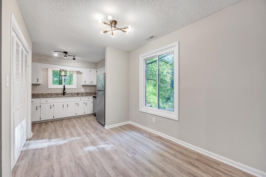 Dining space has a nice green view! - 4115 Arckelton Dr