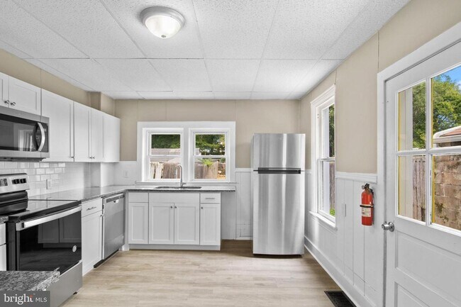 Building Photo - Coming Soon a Spacious Four Bedroom Home i...