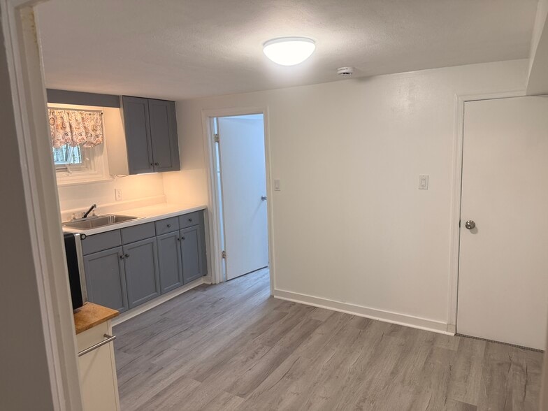 Kitchen with doorway to Full Bath - 201 Ridge Ave
