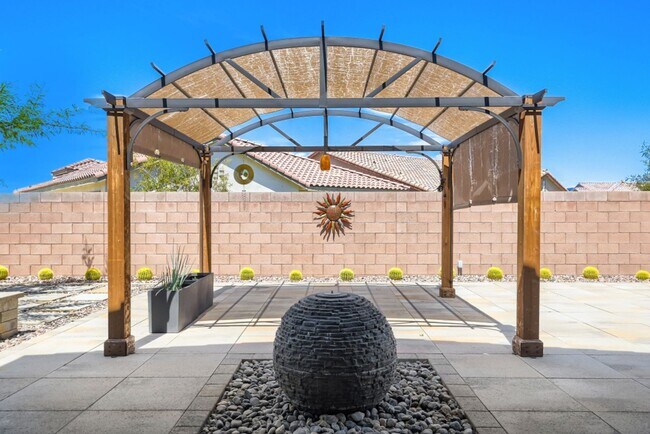 Building Photo - Stunning home with a serene Zen backyard, raised garden beds, fountain and spa!