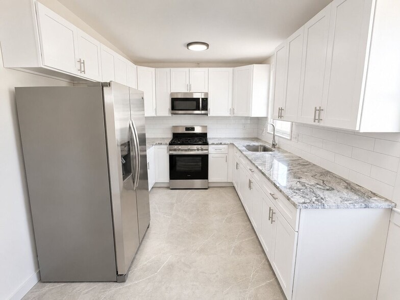 Building Photo - Spacious 3BR Home with Finished Basement, Garage & Driveway in Rhawnhurst
