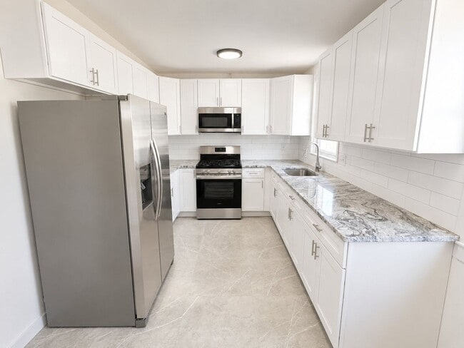 Building Photo - Spacious 3BR Home with Finished Basement, Garage & Driveway in Rhawnhurst