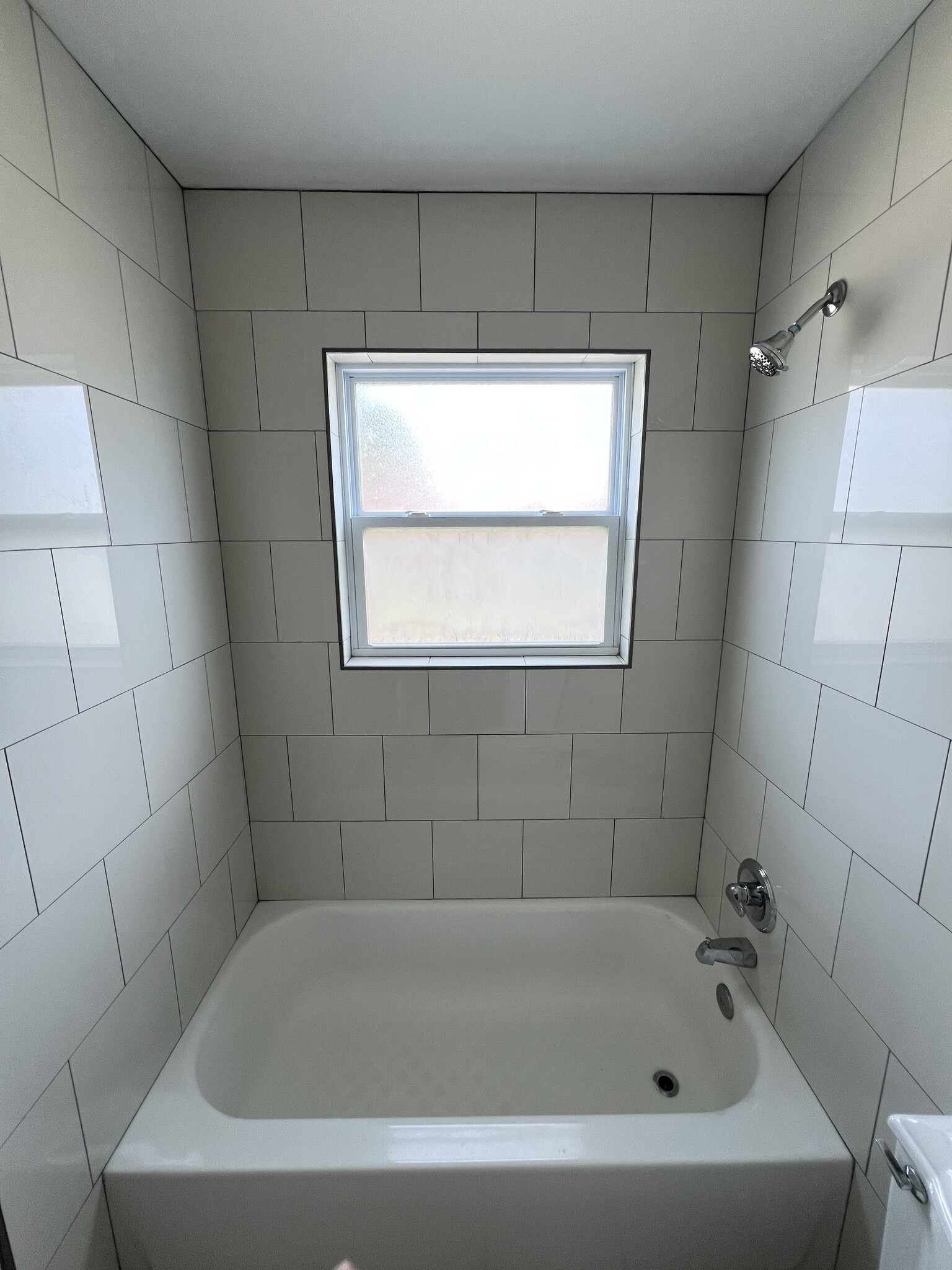 Hall bath (newly tiled) - 415 W Guthrie St