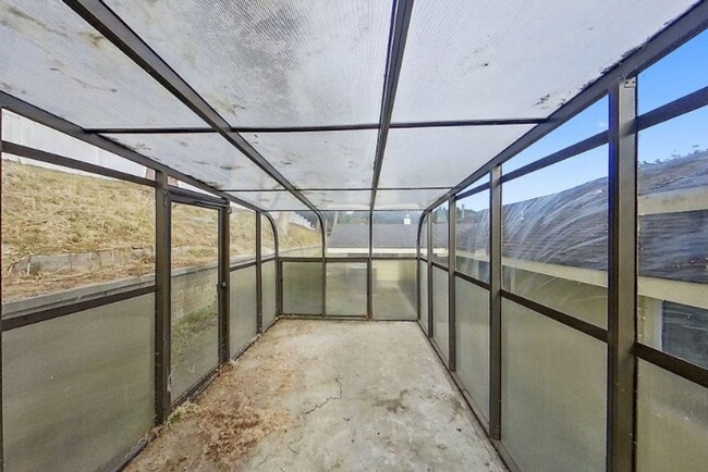 Building Photo - Spacious 4-Bedroom Home with Stunning Hill...