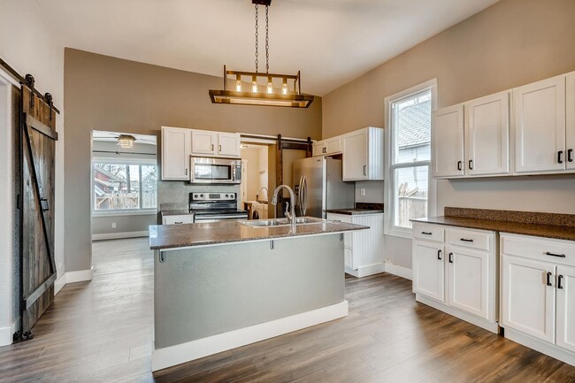 Building Photo - Remodeled Brick Bungalow in Denver's Globe...