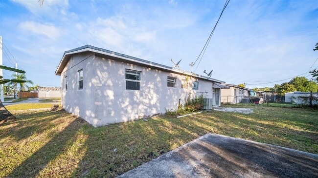 Building Photo - 701 N 70th Ave