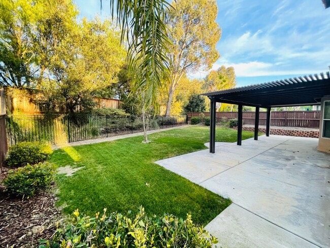 Building Photo - 42020 Dahlia Way