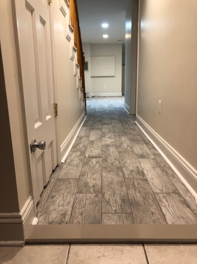 Basement hallway + 1 bedroom to the left - 1204 Florida Ave NE