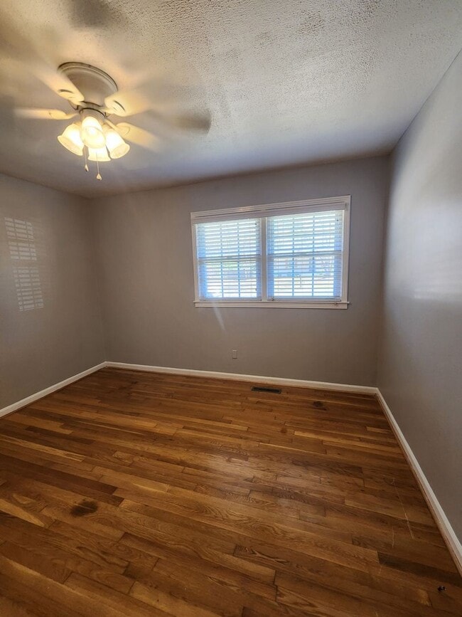 Building Photo - Spacious 3-Bedroom Brick Home with Two Living Areas & Fenced Backyard!