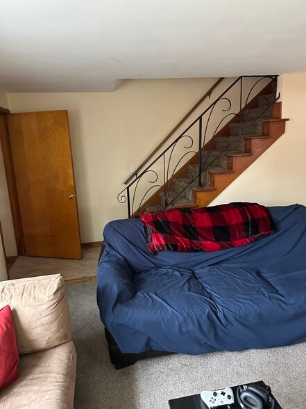 Living Room with Stairway - 201 Tonawanda Creek Rd