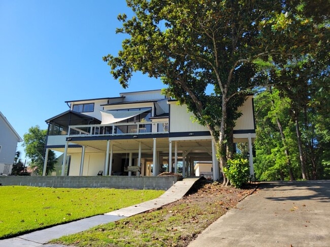Building Photo - Riverfront Living with Private Boat Launch