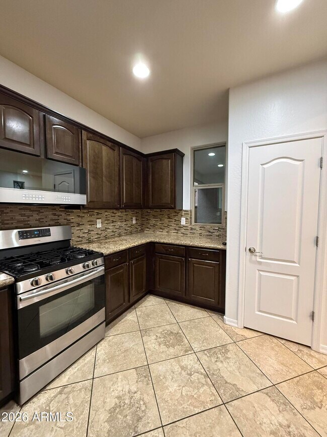 Building Photo - 9242 W Meadow Dr