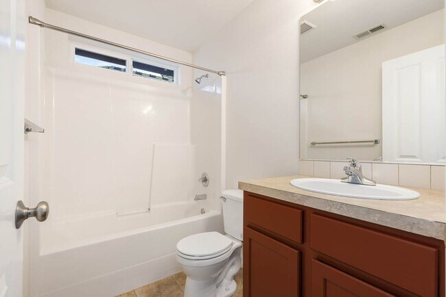 Building Photo - 3 Bedroom Home with Open Layout, Large Garage & Primary Suite