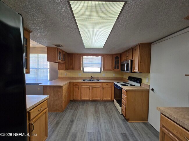 Building Photo - 5639 Sophist Cir N