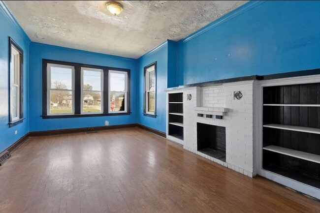 Building Photo - 1301 W 71st Pl