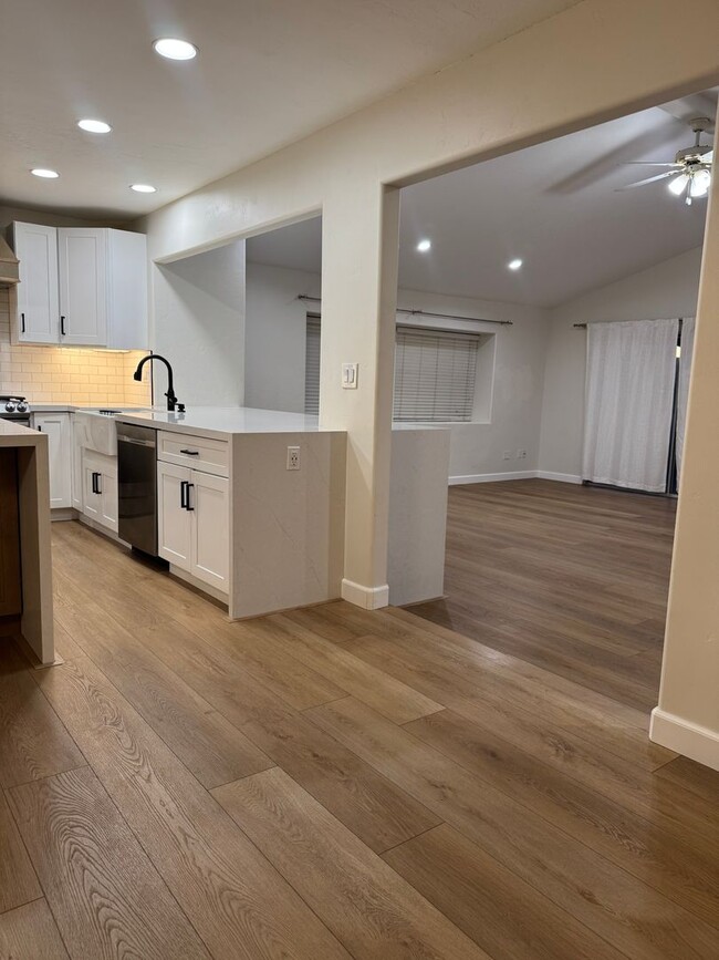 Building Photo - Beautifully Remodeled Home With Front & Si...