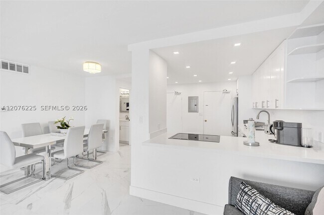 Building Photo - 5555 Collins Ave