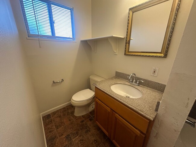 Building Photo - Recently Updated 4 Bedroom Home with Yard