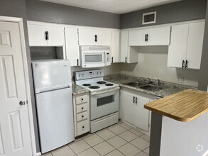 Building Photo - TERRIFIC TWO BEDROOMS ONE BATHRROM REMODEL...