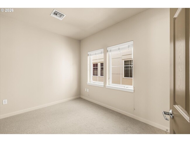 Building Photo - Main Street Living with Granite Kitchen, Gas Fireplace, and MAX Line Access