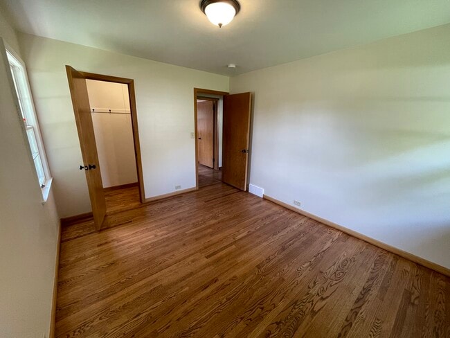 Corner bedroom #1 with walk-in closet - 1208 E 30th St