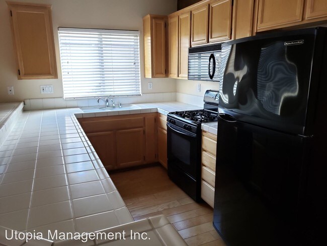 Building Photo - 4 br, 3.5 bath House - 1324 Kondos Ave