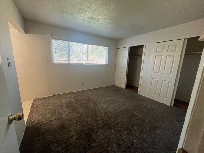 Building Photo - REDUCED!!!  Large 4 bedroom 2 bath home FO...