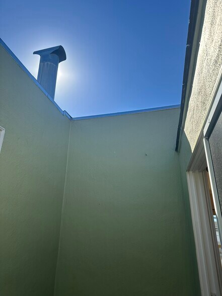 Inside atrium looking up at the sky - 245 Concord St