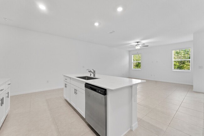 Building Photo - Absolutely stunning 3 BR /2.5 Bath / 2 Car Garage + LOFT townhome in ultra-modern and green-focus...