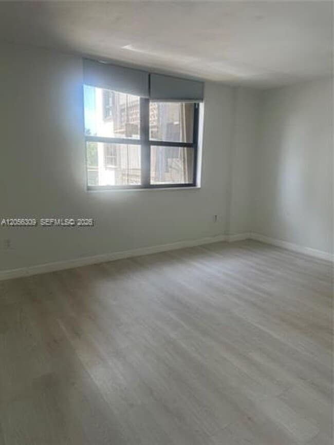 Building Photo - 10185 Collins Ave