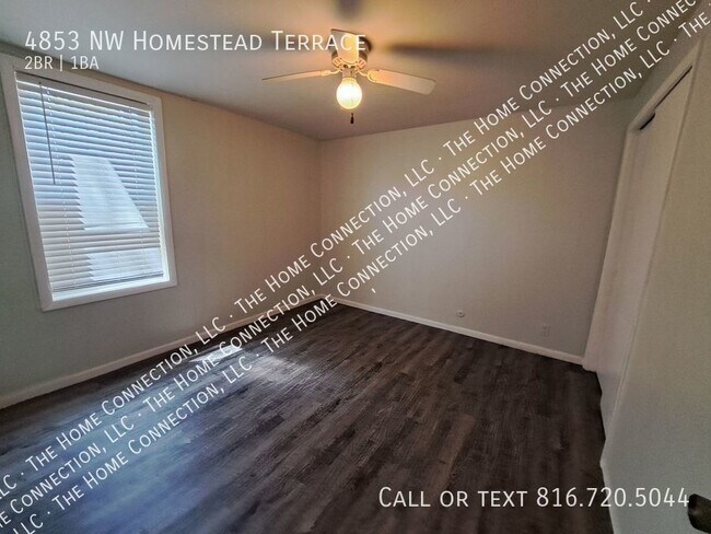 Building Photo - Clean 4-Plex Apartment-Park Hill Schools!