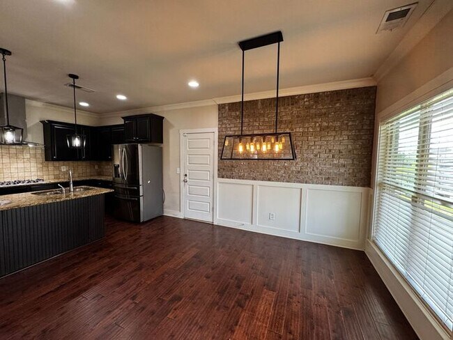 Building Photo - Home in Tech Corridor/Research Park with FENCED YARD and BONUS ROOMS