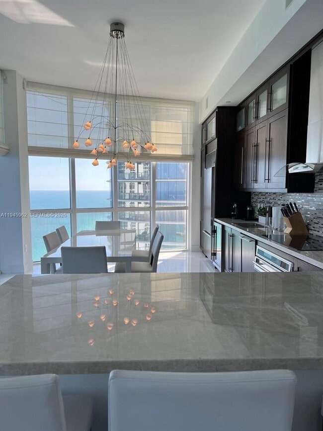Building Photo - 15811 Collins Ave