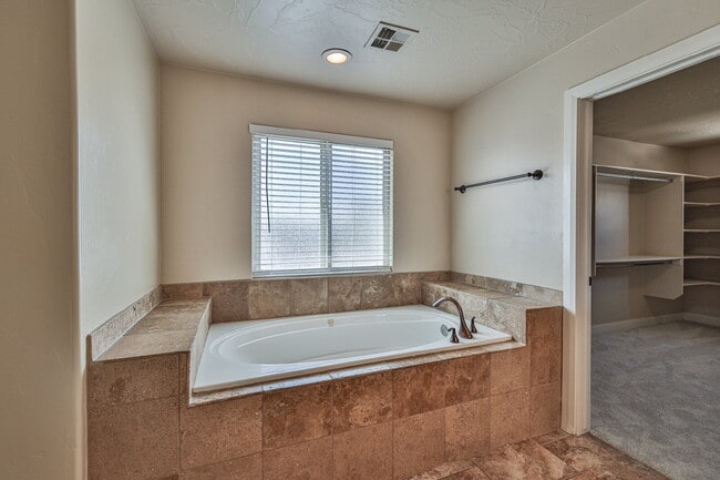 Building Photo - "Spacious 4-Bedroom Retreat with 3,584 Sq ...