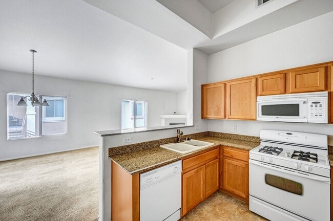 Building Photo - Second Story Condo with Open Floor Plan and Granite Counters