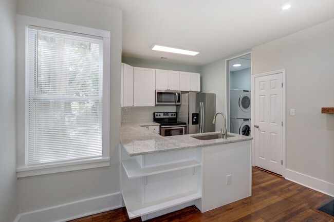 Building Photo - Completely Renovated - Three Bedroom, Two ...