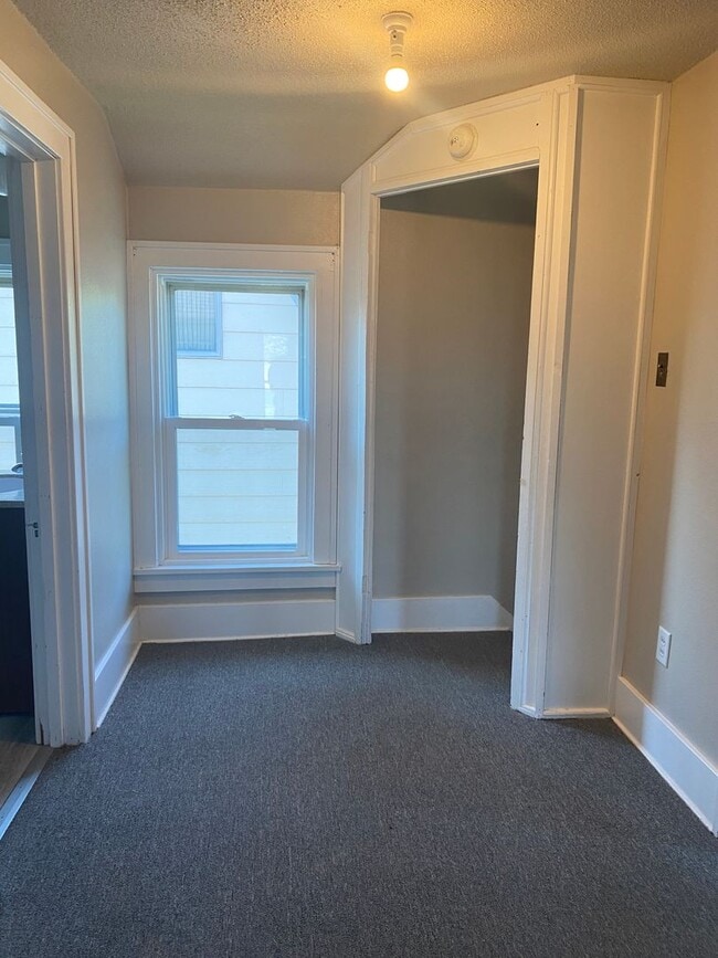 Building Photo - Stylishly Renovated Charming Home on 215 7...