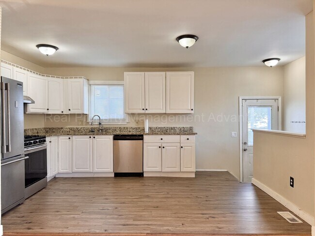 Building Photo - Solid Brick and Renovated with New Kitchen and Two Full Baths!