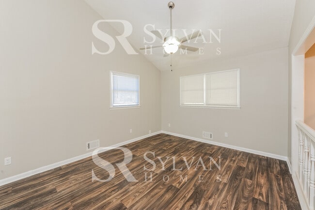 Building Photo - Welcome to this charming abode.