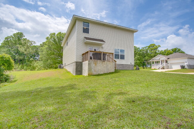 Building Photo - Spacious 4BR Home with 2-Car Garage Near M...