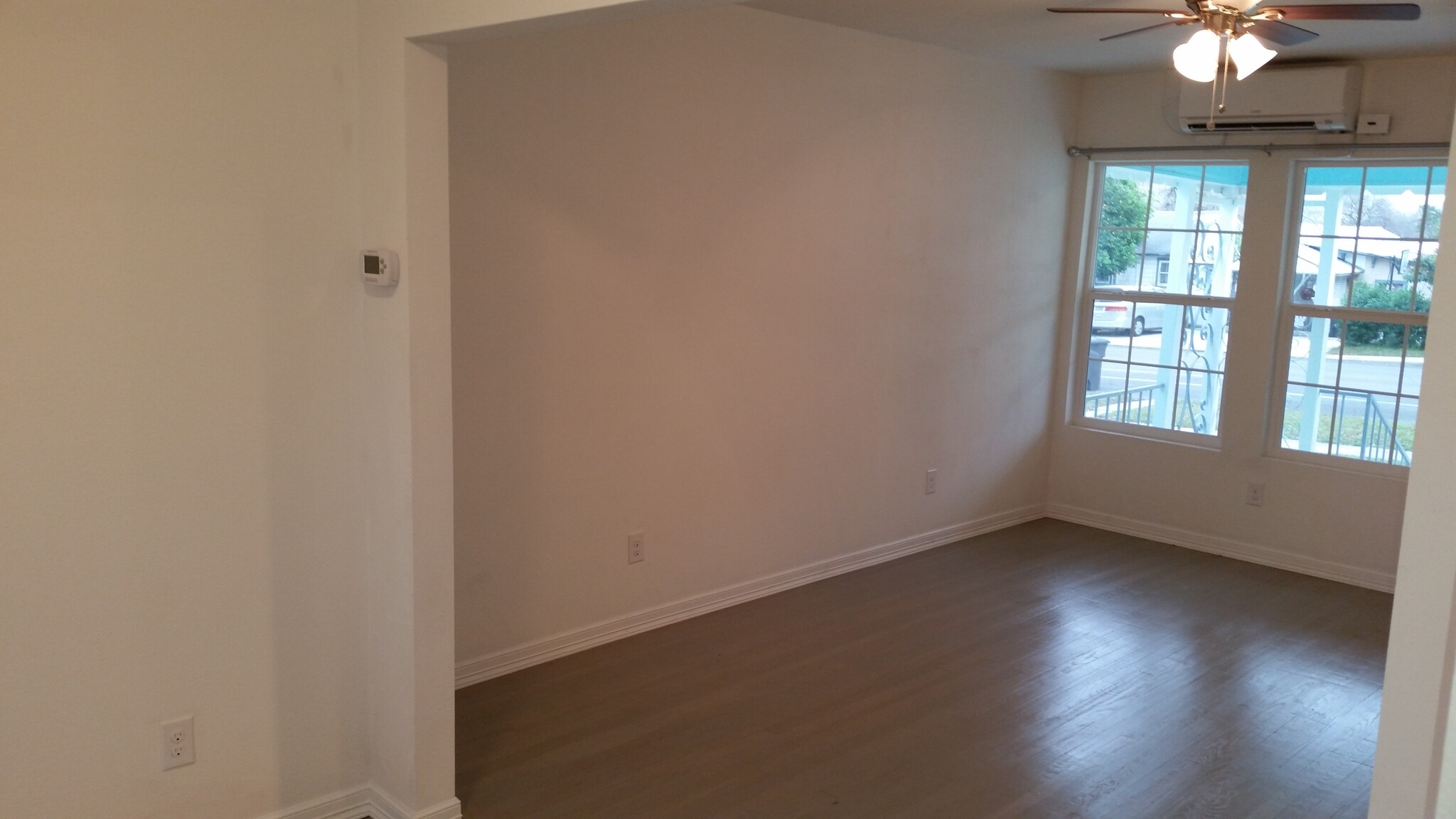 The combined space of the living room and dining area gives this one bedroom a spacious feel. - 2625 Cincinnati Ave