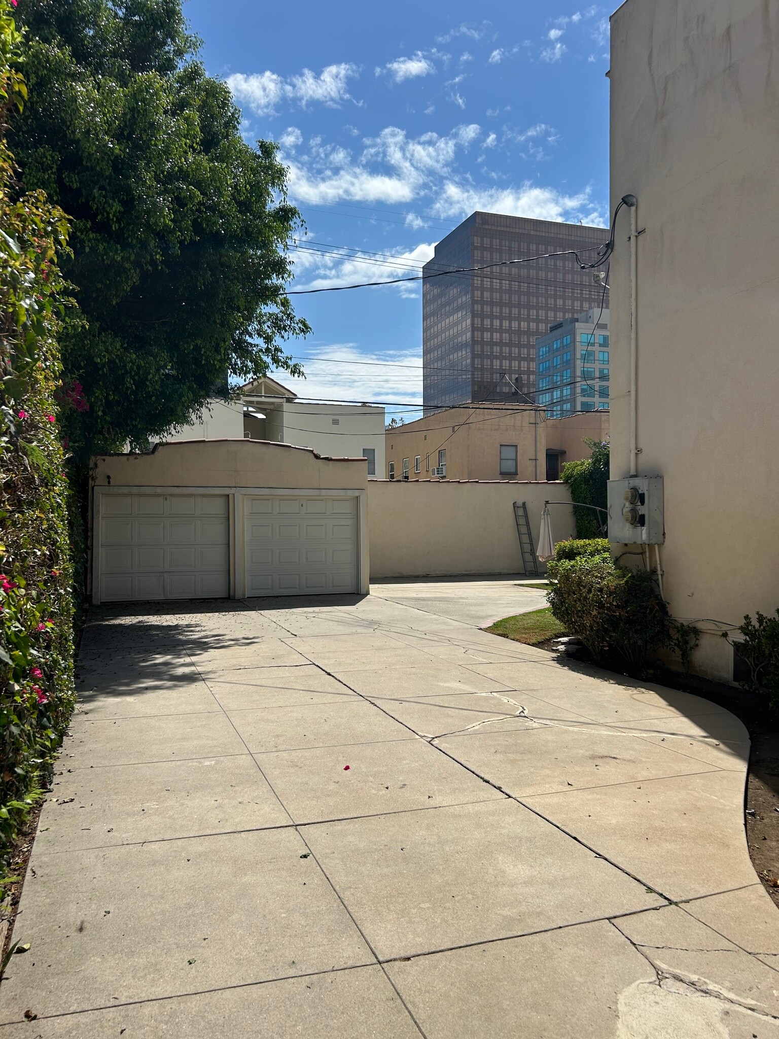 Garage and gated driveway - 6418 W 6th St