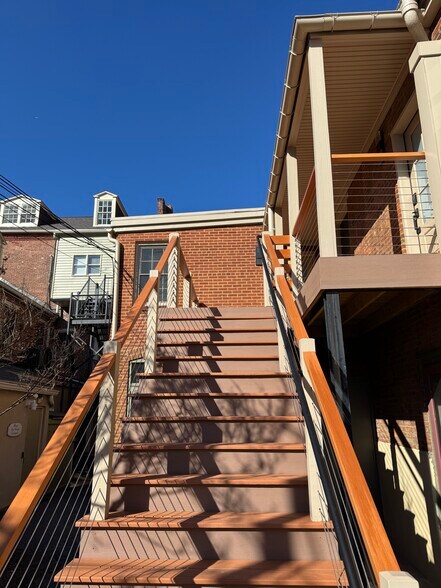 Extra wide stairs to deck and apartment entrance - 136 E King St