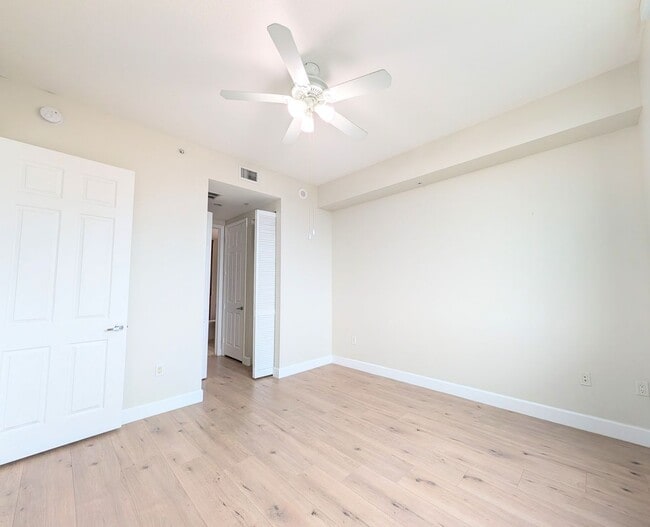 Building Photo - Modern 1BR/1BA Condo with 2 Parking Spaces – Prime Coral Gables Location