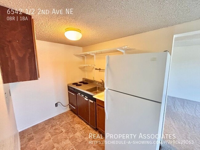 Building Photo - 6542 1/2 2nd Ave NE-